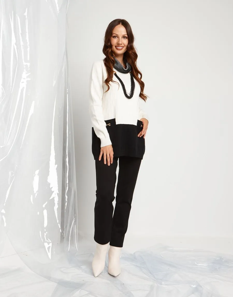 Maglia con collo alto e morsetti